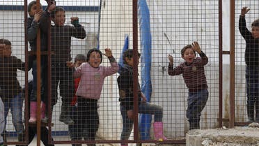 Internally displaced Syrian children play at a refugee camp near the Bab al-Salam crossing, across from Turkey's Kilis province, on the outskirts of the northern border town of Azaz, Syria February 6, 2016.  (Reuters)