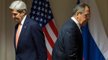 U.S. Secretary of State John Kerry, left, and Russian Foreign Minister Sergey Lavrov walk to their seats for a meeting about Syria, in Zurich, Switzerland, on Wednesday, Jan. 20, 2016. (AP)