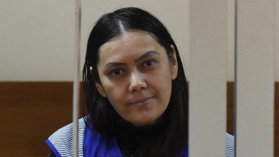 Gyulchekhra Bobokulova told journalists that "Allah ordered" the killing of a young girl in her care at a courthouse in Moscow, on March 2, 2016 (AFP)