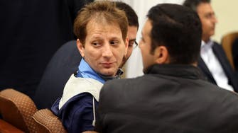 Iran court sentences billionaire to death