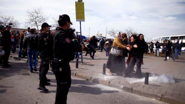 Riot police use tear gas to disperse women gathered to protest against the government and violence against women, prior to International Women's Day on Tuesday, in Kadikoy, Istanbul, Sunday, March 6, 2016.(AP)