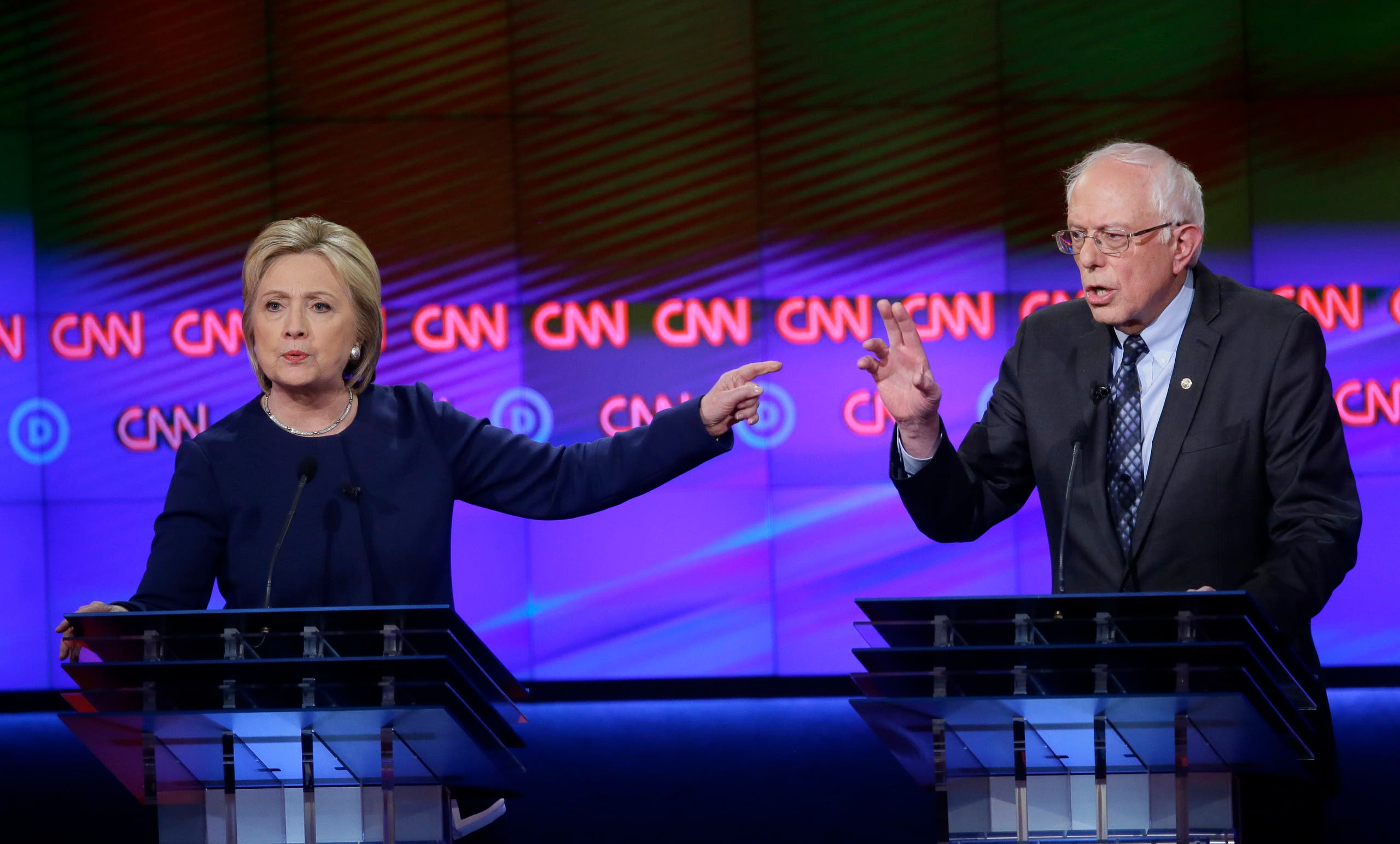 Hillary Clinton and Bernie Sanders argue during the Democratic presidential primary debate at the University of Michigan-Flint on March 6. (AP)