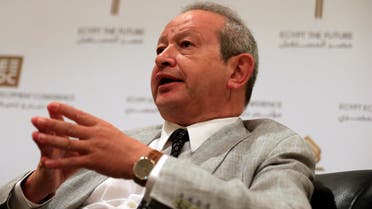 [Window Title] Enter name of file to save to…  [Content] Egyptian billionaire businessman Naguib Sawiris speaks to The Associated Press prior to the opening of a major economic conference seeking billions of dollars in investment, in Sharm el-Sheikh, Egypt, Friday, March 13, 2015.  (AP) The file name is not valid.  [OK]