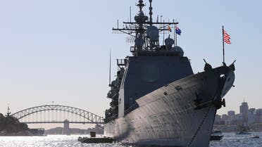The USS Chosin is seen at anchor in front of the Harbour Bridge in Sydney, Australia, Friday, Oct. 4, 2013 ap