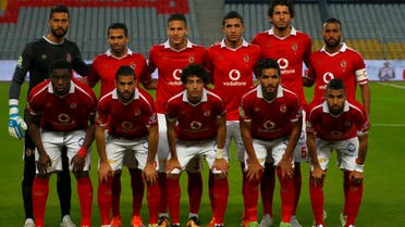Al Ahly players pose for pictures before their Egyptian Premier League soccer match against Al Masry at Borg El Arab "Army Stadium", west of the Mediterranean city of Alexandria. (Reuters)