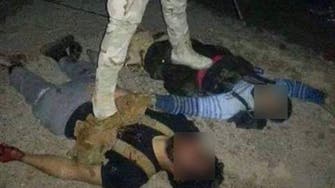 Tunisian soldiers take selfies with dead ISIS militants 