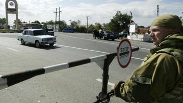 A soldier guards a checkpoint in Nazran, in the volatile Russian region of Ingushetia (AFP)
