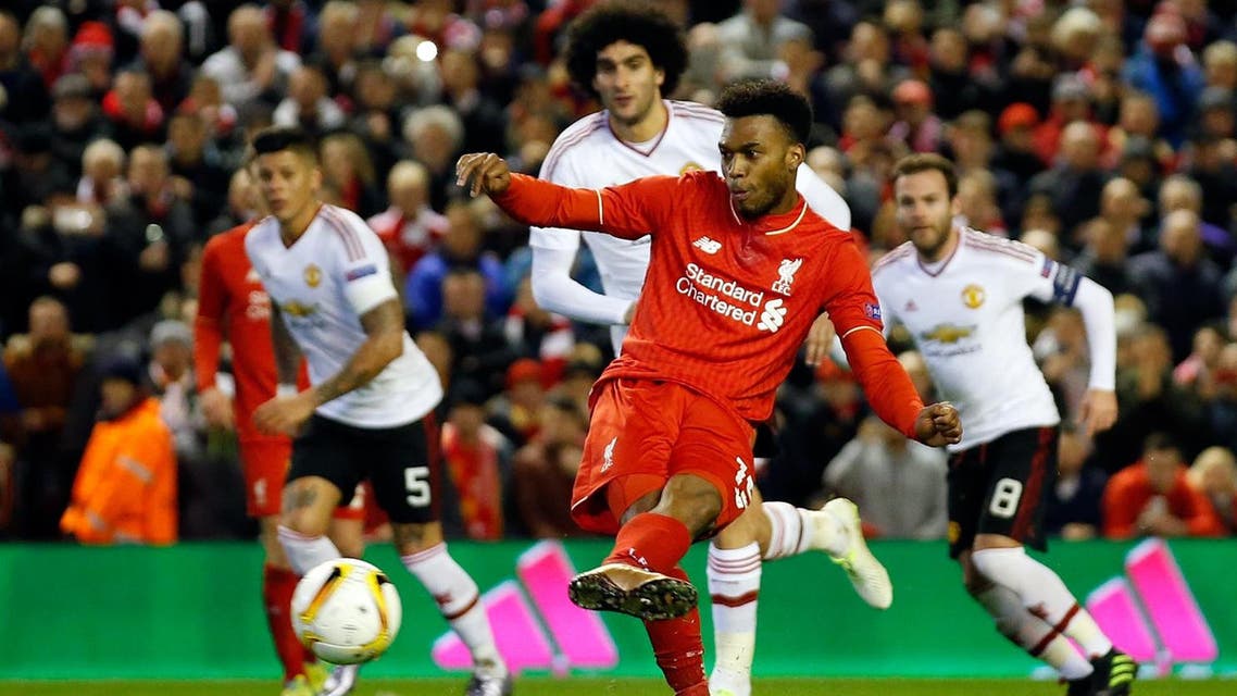 Liverpool’s Daniel Sturridge scores the opening goal from the penalty spot during the Europa League round of 16, first leg, soccer match between Liverpool and Manchester United at Anfield Stadium, Liverpool, England, Thursday March 10, 2016. (AP)