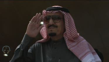 Saudi King Salman salutes the marching armies. (Al Arabiya)