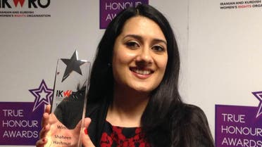 Shaheen Hashmat shows her True Honour award presented to her by British charity IKWRO in London on March 10, 2016. Hashmat was praised for her “enormous bravery” in standing up to honour-based abuse. ThompsonReutersFoundation