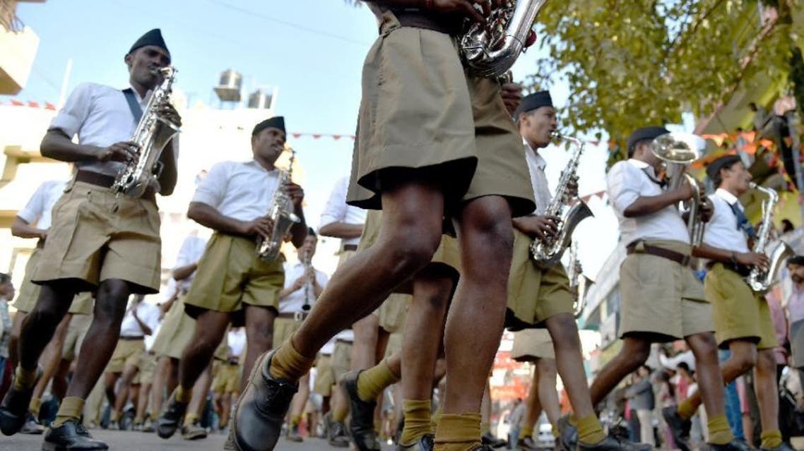 Foot soldiers of the Rashtriya Swayamsevak Sangh (RSS) are often seen after dawn across India engaged in physical drills and uttering religious chants -- dressed in pleated shorts, white shirts and black hats (AFP)