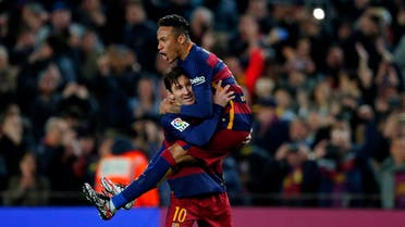 FC Barcelona's Lionel Messi, left, celebrates after scoring against Sevilla with his teammate Neymar during a Spanish La Liga soccer match at the Camp Nou stadium in Barcelona, Spain, Sunday, Feb. 28, 2016. (AP)