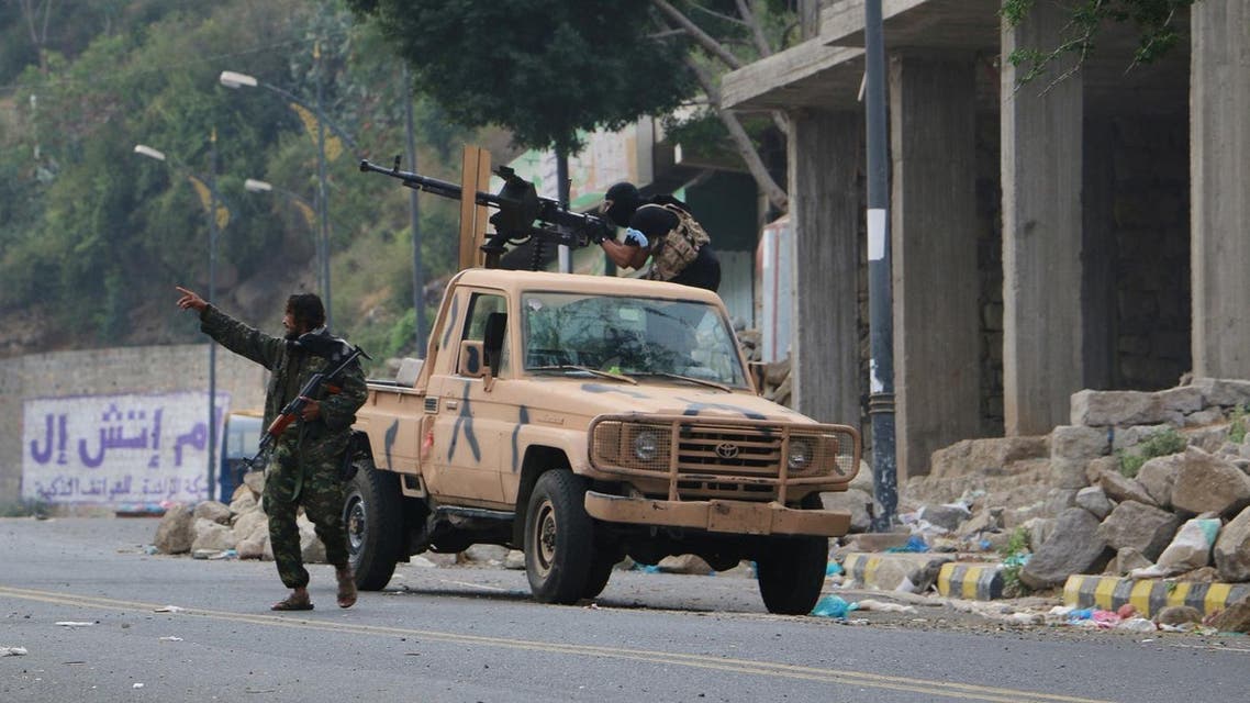 Tribal fighters take position on a street during fighting with Shiite rebels known as Houthis, in Taiz, Yemen, Tuesday, Dec. 15, 2015. Yemen has been torn by fighting pitting the rebels, known as Houthis, and army units loyal to former President Ali Abdullah Saleh against an array of forces, including the internationally recognized government, which is backed by the Saudi-led coalition and supported by the United States, and also southern separatists, religious extremists and other militants. (AP)