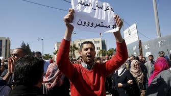 Palestinian schoolteachers agree to end month-long strike
