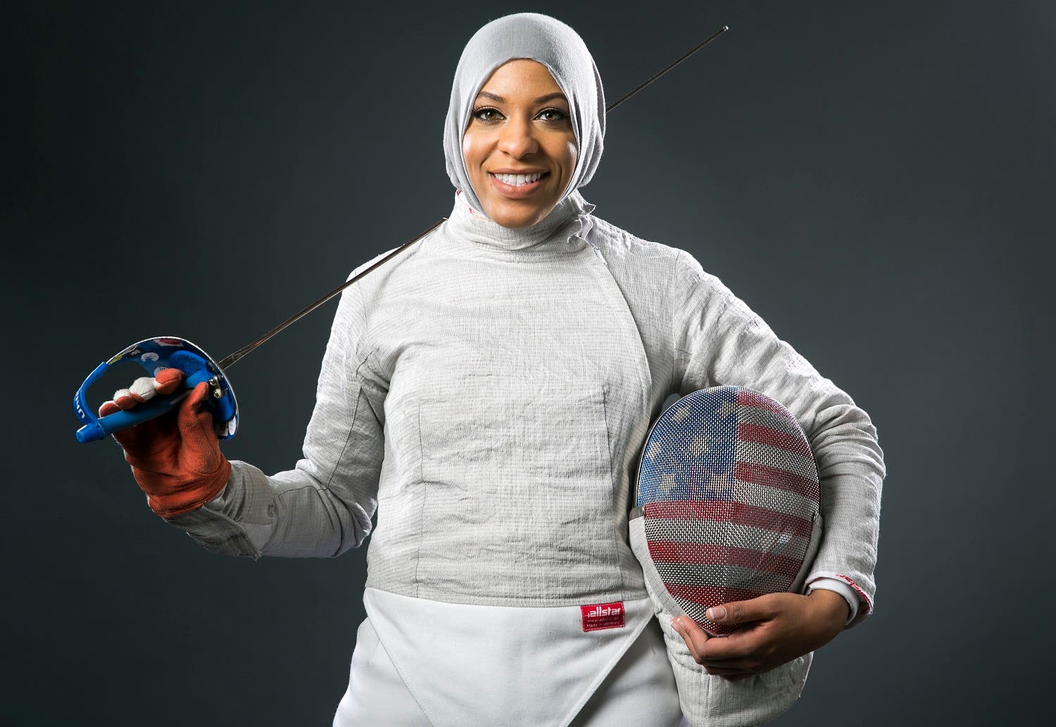 Fencer Ibtihaj Muhammad poses for photos at the 2016 Team USA Media Summit Wednesday, March 9, 2016, in Beverly Hills, Calif. (AP)