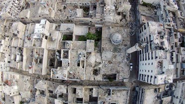 A aerial view shows a damaged mosque and surrounding buildings in the Al-Maysar neighbourhood of Aleppo, April 23, 2015. (Reuters)