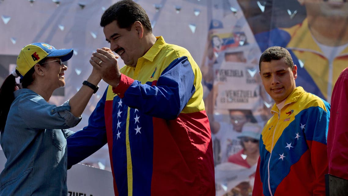 Venezuela’s President Nicolas Maduro dances with his wife Cilia Flores, during an anti-U.S. rally, in Caracas, Venezuela, Saturday, March 12, 2016. Earlier in the week Maduro called back to Caracas Venezuela’s top diplomat in Washington, protesting the renewal of sanctions by President Barack Obama on several of Venezuela’s top officials over human rights violations. The two nations haven’t exchanged ambassadors since 2010. (AP)