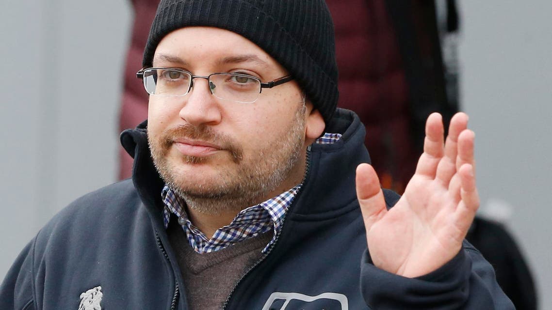 U.S. journalist Jason Rezaian waves as he poses for media people in front of Landstuhl Regional Medical Center in Landstuhl, Germany, Wednesday, Jan. 20, 2016. (AP)