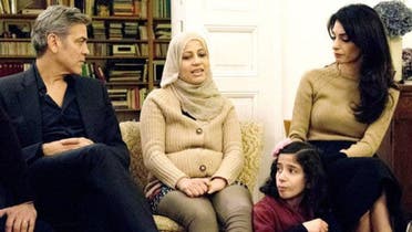 Hollywood actor George Clooney and his international human rights lawyer wife Amal met with Syrian refugee families. (Screenshot)