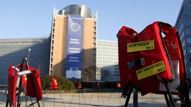 Lifejackets are pictured in front of the European Commission headquarters during a protest by Amnesty International to demand the European Council protect the human rights of the refugees within the EU-Turkey migration deal, ahead of an EU summit over migration in Brussels, Belgium, March 17, 2016. REUTERS/Francois Lenoir