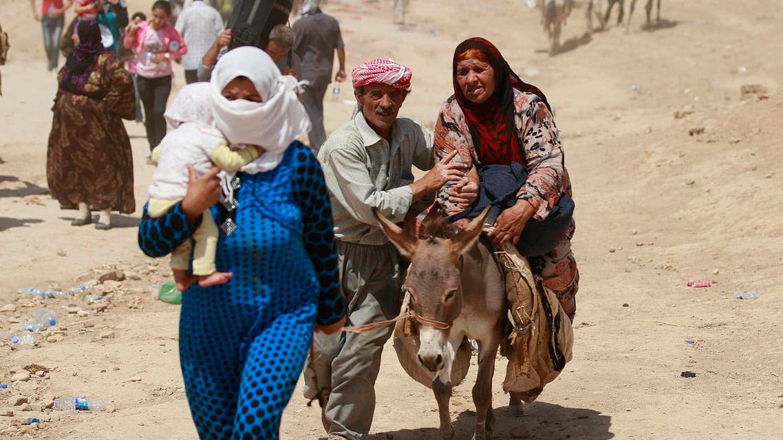 Syrian refugees cross into Iraq at the Peshkhabour border point in Dahuk. (File photo: Reuters)