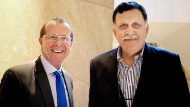 In this Feb. 17, 2016 file photo, U.N. special envoy for Libya Martin Kobler, left, is greeted by Fayez Serraj, Libyan designated-prime minister and head of the presidential council, in Cairo, Egypt (AP)