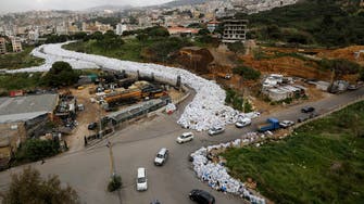 Lorries begin moving Beirut’s mountains of trash to landfill