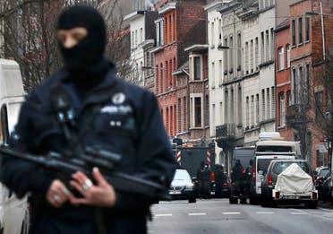 Police at the scene of a security operation in the Brussels suburb of Molenbeek in Brussels, Belgium, March 18, 2016 (Reuters)