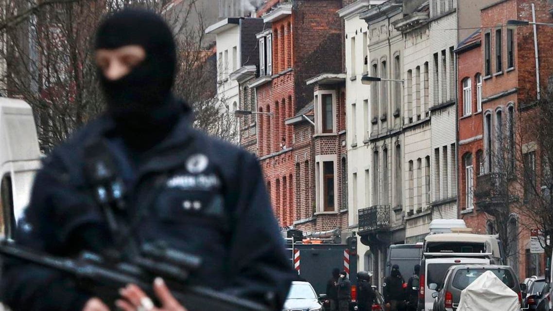 Police at the scene of a security operation in the Brussels suburb of Molenbeek in Brussels, Belgium, March 18, 2016 (Reuters)