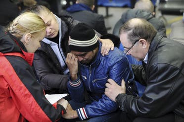 Relative of a victim of crashed Flydubai Boeing 737-800 reacts at airport of Rostov-On-Don. (Reuters)