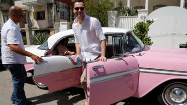 Co-founder of Airbnb Nathan Blecharczyk gets out of a classic American car taxi as he arrives to the guesthouse of Armando Usain in Havana, Cuba, Wednesday, June 24, 2015. During his first trip to Havana, Blecharczyk said that AirBnb had requested a special license allowing people from outside the US to use the San Francisco-based business to reserve stays at private homes inside Cuba. (AP)