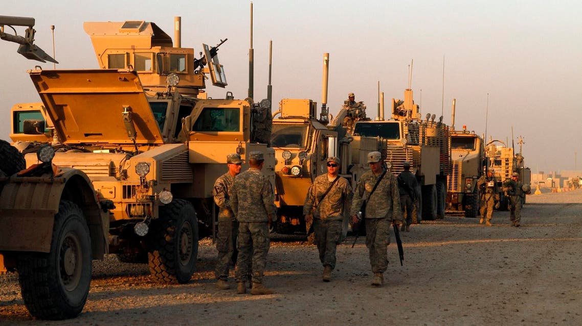 In this Saturday, Dec. 17, 2011 photo, U.S. Army soldiers from 3rd Brigade, 1st Cavalry Division, based at Fort Hood, Texas, stage their armored vehicles at Camp Adder during final preparations for the last American convoy to leave Iraq. (File photo: AP)