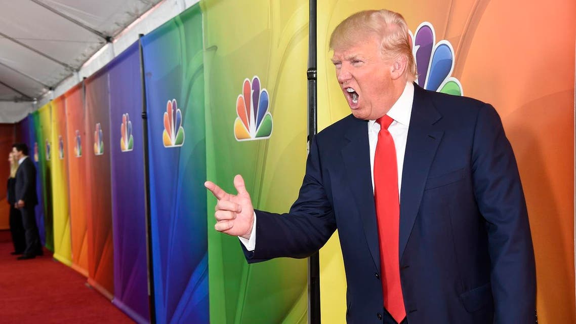 Donald Trump, host of the television series "The Celebrity Apprentice," mugs for photographers at the NBC 2015 Winter TCA Press Tour at The Langham Huntington Hotel on Friday, Jan. 16, 2015. (AP)