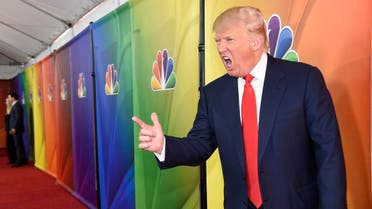Donald Trump, host of the television series "The Celebrity Apprentice," mugs for photographers at the NBC 2015 Winter TCA Press Tour at The Langham Huntington Hotel on Friday, Jan. 16, 2015. (AP)