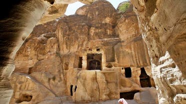 At Little Petra’s entrance, locals sold plastic ponchos and umbrellas to bands of shivering tourists. White mist poured over the mountains, obscuring the temples inside into “the cold canyon,” Little Petra’s name in Arabic, Siq al-Barid (Reuters)