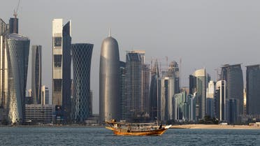 In this Thursday Jan. 6, 2011 file photo, a traditional dhow floats in the Corniche Bay area with tall buildings of the financial district in the background. (AP)