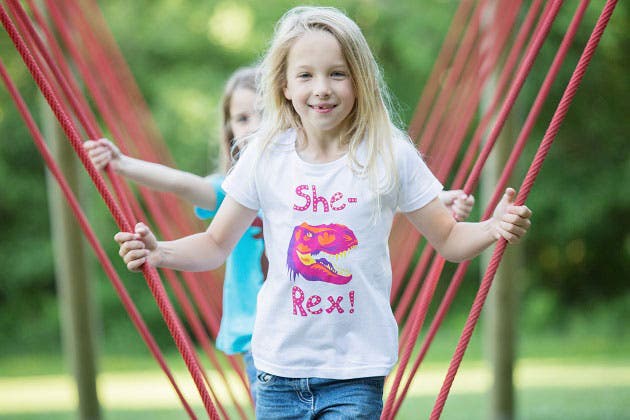 Clothing line features cute dinosaurs carrying flowers, female robots and a feisty girl robot. (Photo courtesy: climbingtreeskids.com)