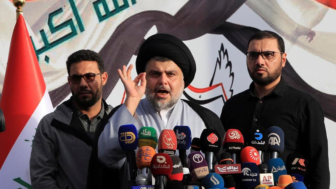 Shiite cleric Muqtada al-Sadr, center, gives a speech to his supporters before entering the highly fortified Green Zone, in Baghdad, Iraq, Sunday, March, 27, 2016. Al-Sadr brushed past security checkpoints to enter Baghdad’s highly fortified Green Zone Sunday after weeks of protests in the Iraqi capital. (AP)