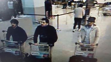 CAPTION ADDITION TO ADD IDENTIFICATION OF INDIVIDUAL : In this image provided by the Belgian Federal Police in Brussels on Tuesday, March 22, 2016, three men who are suspected of taking part in the attacks at Belgium's Zaventem Airport and are being sought by police. The men on both the left and right are yet unidentified, the man at center has been the identified by the Federal Prosecutors office on Wednesday, March 23, 2016 as Ibrahim El Bakraoui. (Belgian Federal Police via AP)