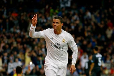 Real Madrid's Cristiano Ronaldo celebrates after scoring against Sevilla during a Spanish La Liga soccer match between Real Madrid and Sevilla at the Santiago Bernabeu stadium, in Madrid, Sunday, March 20, 2016. Ronaldo scored once in Real Madrid's 4-0 victory. (AP)