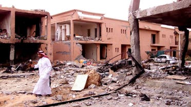 A Saudi security man walks in front of a damaged building after an al-Qaeda suicide attack on a compound used by expatriates in Riyadh May 13, 2003. (File photo: Reuters)
