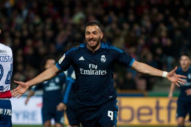 Real Madrid 's Karim Benzema celebrates his goal during a Spanish La Liga soccer match between Granada and Real Madrid at Los Carmenes stadium in Granada, Spain, Sunday, Feb. 7, 2016. (AP)