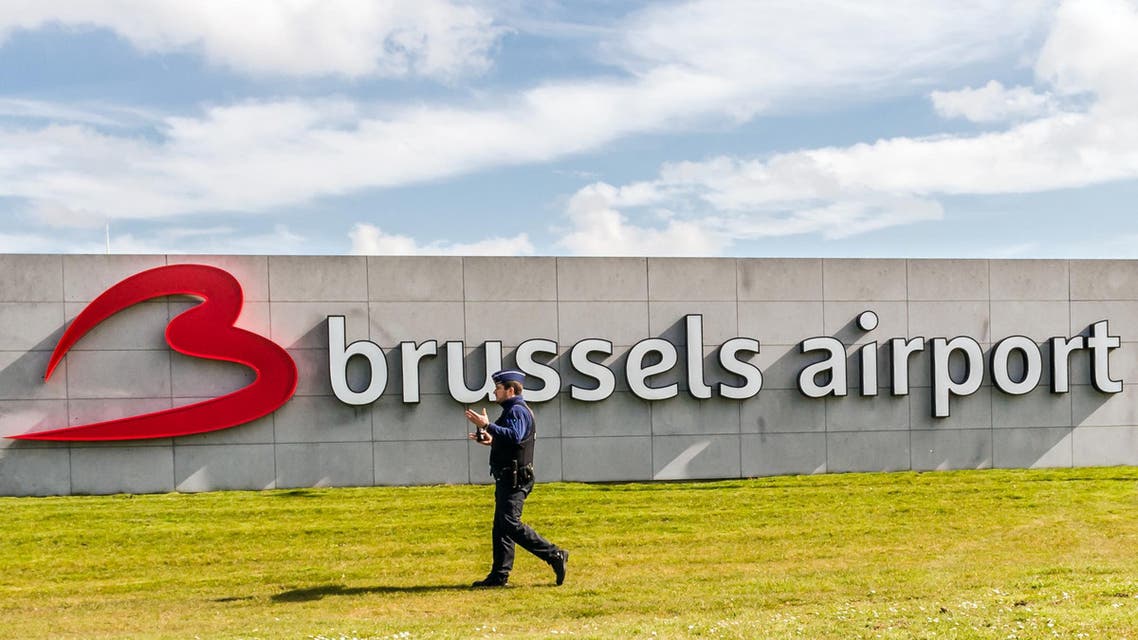 A policeman patrols at Brussels Airport, in Zaventem, Belgium, Sunday, April 3, 2016. Under extra security, three Brussels Airlines flights, the first for Faro in Portugal, are scheduled to leave Sunday from an airport that used to handle about 600 flights a day. (AP Photo/Geert Vanden Wijngaert)