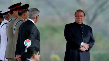  Pakistan's Prime Minister Nawaz Sharif, right, attends a military parade to mark Pakistan's Republic Day in Islamabad, Pakistan, Wednesday, March 23, 2016. Pakistan's President praised his country's security forces and pledged to continue the fight against terrorism, speaking at a rally during a national holiday. During the rally, attended by several thousand people, Pakistan displayed nuclear-capable weapons, tanks, jets, drones and other weapons systems. (AP Photo/Anjum Naveed)