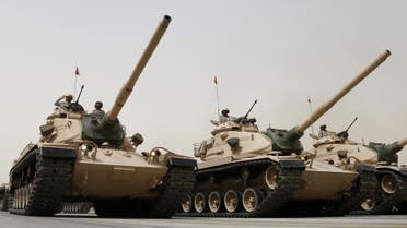 Tanks roll during Saudi security forces' Abdullah's Sword military drill in Hafar Al-Batin, near the border with Kuwait April 29, 2014. (Reuters)