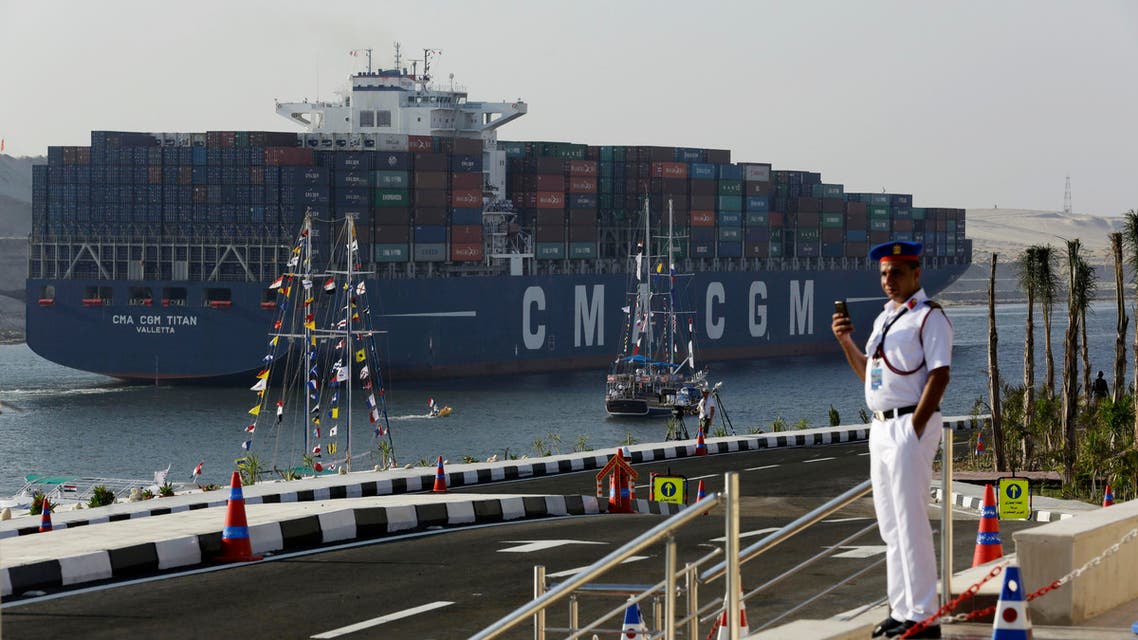 In this Thursday, Aug. 6, 2015 file photo, a cargo container ship crosses the new section of the Suez Canal after the opening ceremony in Ismailia, Egypt.  (AP)