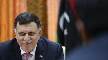 Fayez Serraj, head of the U.N.-backed unity government meets with his team in Tripoli, Libya, Thursday, March 31, 2016. (AP)