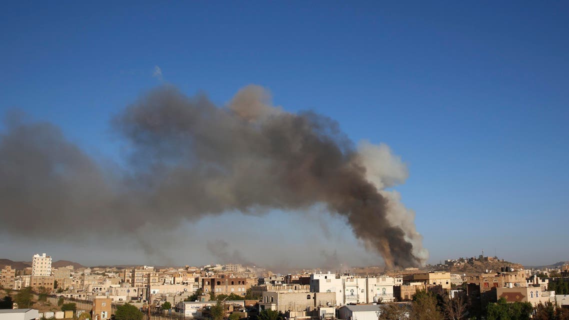  FILE -- In this Sept. 11, 2015 file photo, smoke rises after an airstrike by the Saudi-led coalition at a weapons depot in Sanaa, Yemen. Hunger has been the most horrific consequence of Yemen’s conflict and has spiraled since Saudi Arabia and its allies, backed by the U.S., launched a campaign of airstrikes and a naval blockade a year ago. (AP Photo/Hani Mohammed, File)