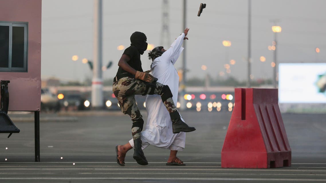In this Thursday, Sept. 17, 2015 file photo, Saudi security forces show their skills to handle a terrorist attack as they take part in a military parade AP