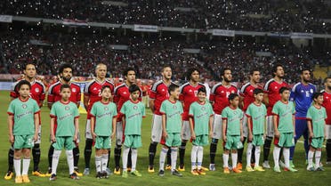 Egypt players listen the national anthem before the game against Nigeria last month. (Reuters)